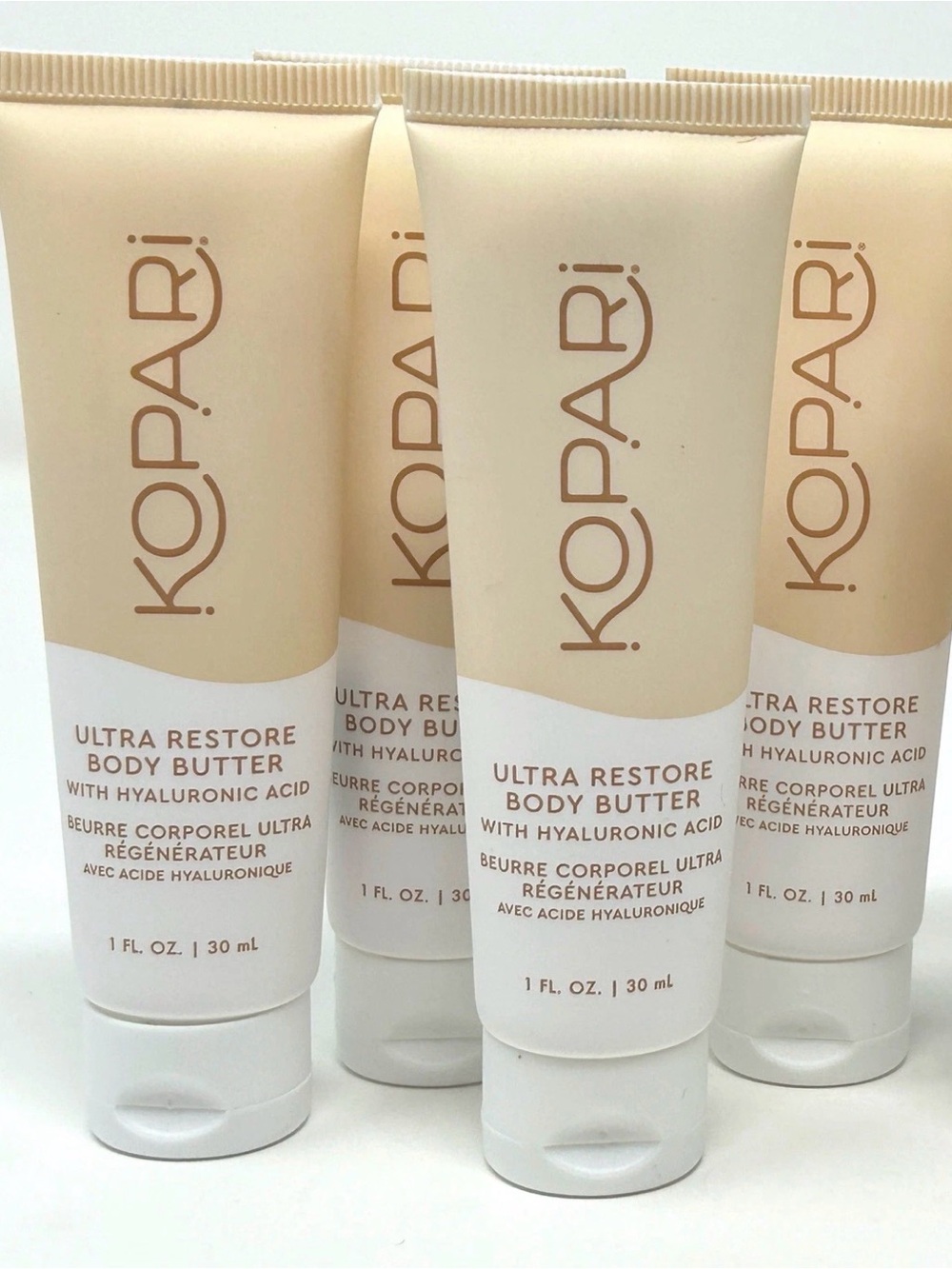 4x Kopari Ultra Restore Body Butter - Beige & White Tubes